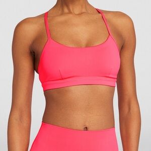 Alo Yoga Airlift Intrigue Bra in Fluorescent Pink Coral